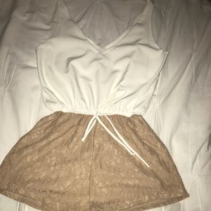 Love Ady ivory and tan romper.